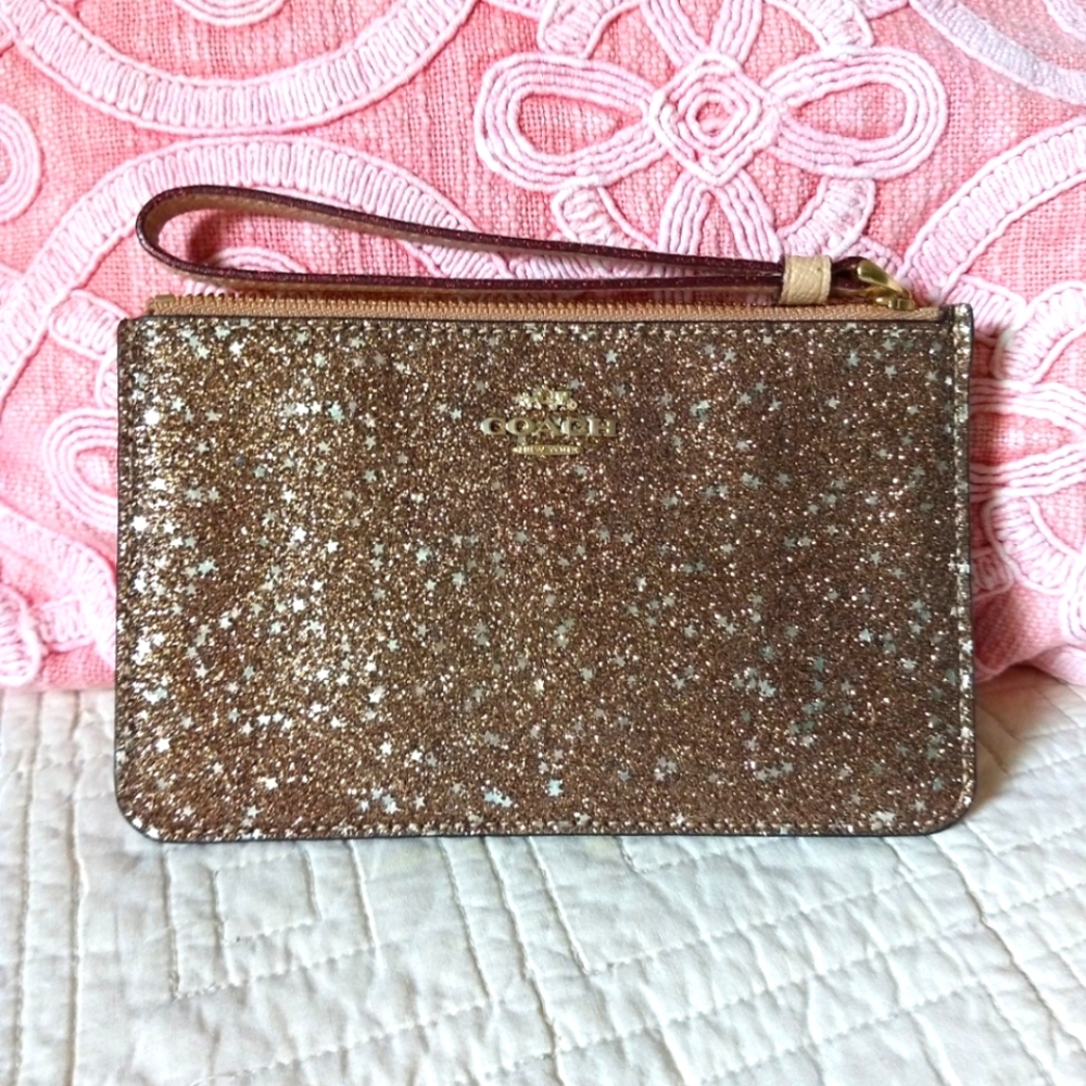 Like new Designer Coach Corner Zip Wristlet - Rose Gold Glitter w/Stars F22705